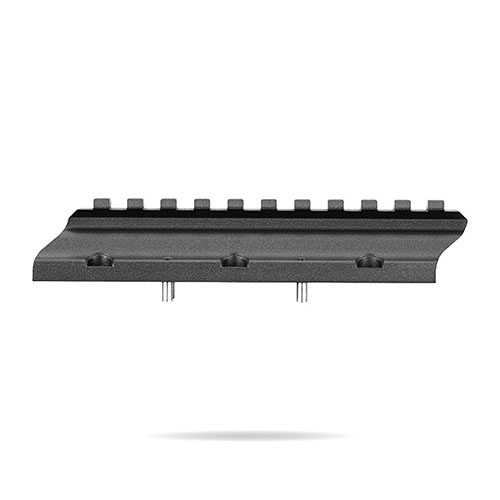 El MDT ACC Elite NV Bridge es un riel Picatinny que se monta en la parte superior del forend, permitiendo opciones versátiles para dispositivos de visión nocturna y reduciendo efectos de miraje.